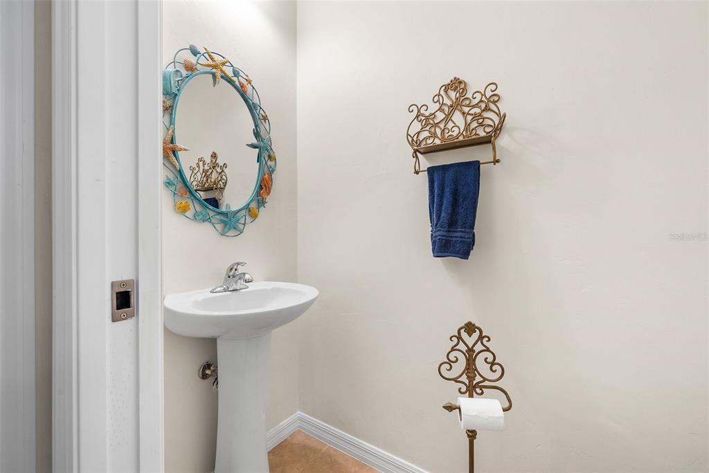 7638 Southwest 80th Drive Gainesville, FL 32608 - Photo 24 of 48 a bathroom with a sink and mirror