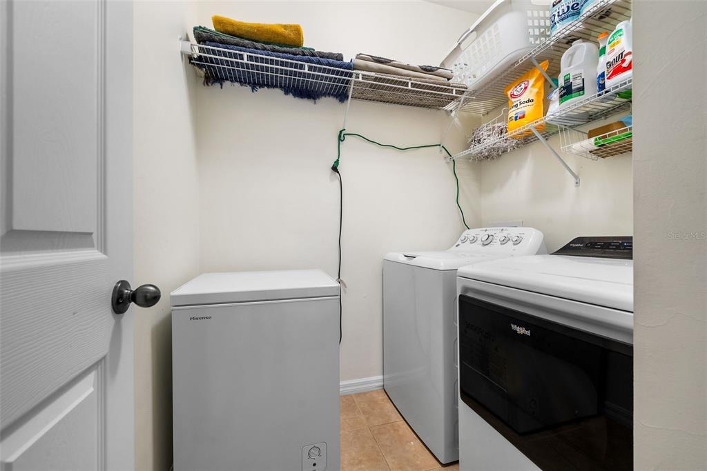 7638 Southwest 80th Drive Gainesville, FL 32608 - Photo 28 of 48 a utility room with dryer and washer