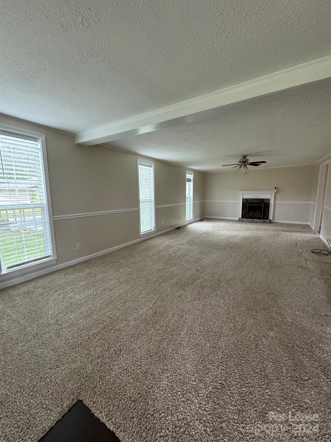 2793 Highway 268 Lenoir, NC 28645 - Photo 2 of 29 an empty room with windows