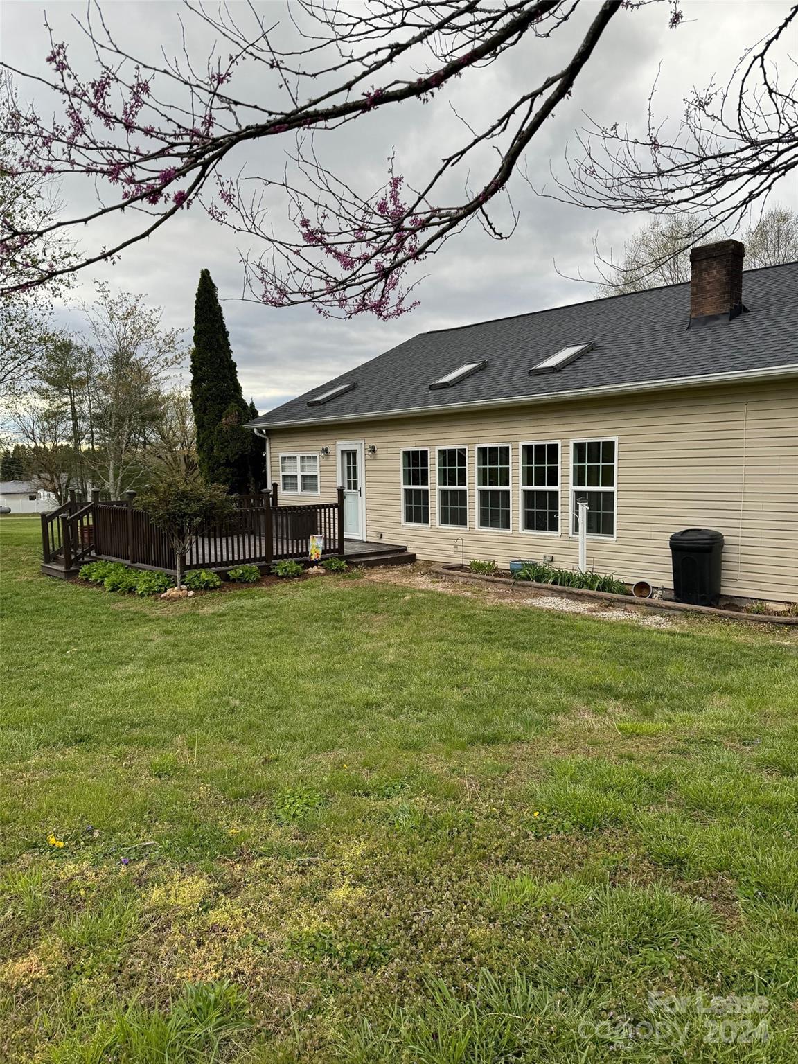 2793 Highway 268 Lenoir, NC 28645 - Photo 26 of 29 a front view of a house with a yard