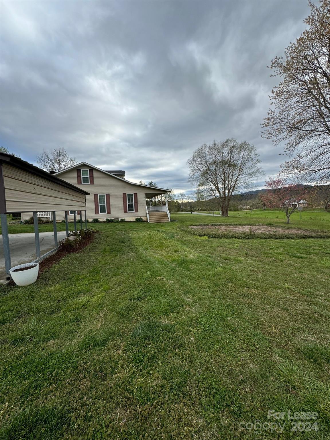 2793 Highway 268 Lenoir, NC 28645 - Photo 28 of 29 a view of a swimming pool with an outdoor seating and deck