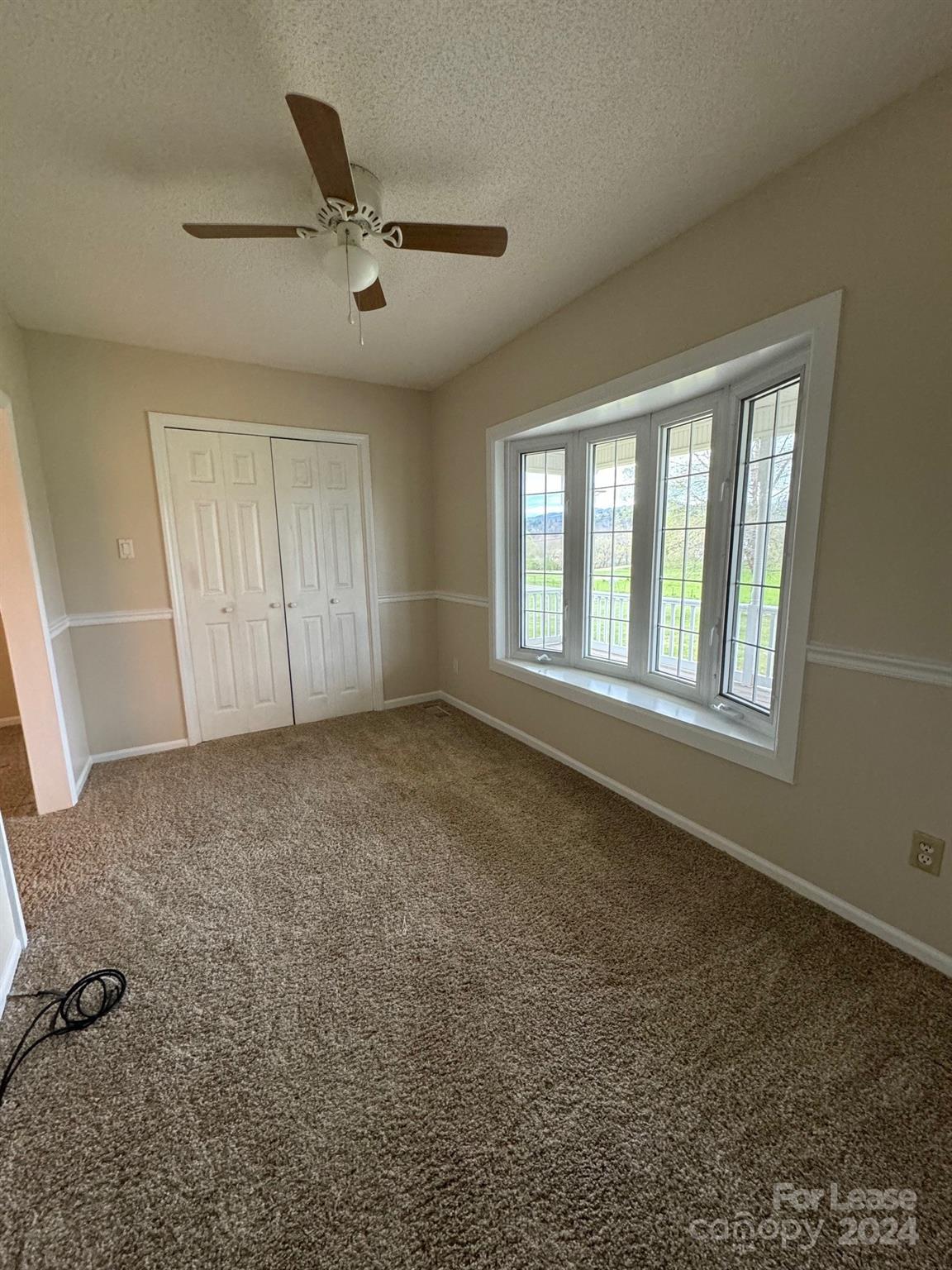 2793 Highway 268 Lenoir, NC 28645 - Photo 3 of 29 a view of an empty room with a window