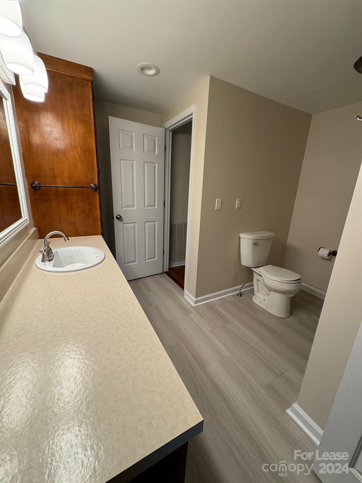 2793 Highway 268 Lenoir, NC 28645 - Photo 7 of 29 a bathroom with a sink and a toilet