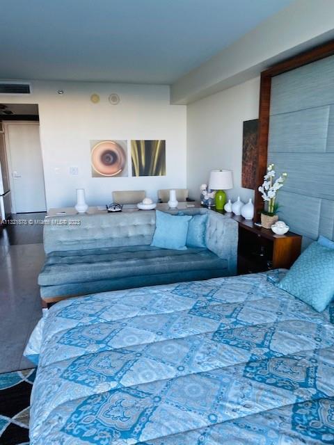 50 Biscayne Boulevard, Unit 709 Miami, FL 33132 - Photo 11 of 18 a living room with furniture and a fireplace