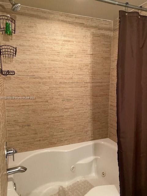 50 Biscayne Boulevard, Unit 709 Miami, FL 33132 - Photo 6 of 18 a bathroom with a bathtub and shower