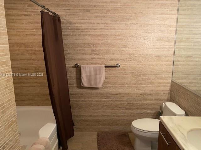 50 Biscayne Boulevard, Unit 709 Miami, FL 33132 - Photo 7 of 18 a bathroom with a toilet and a shower