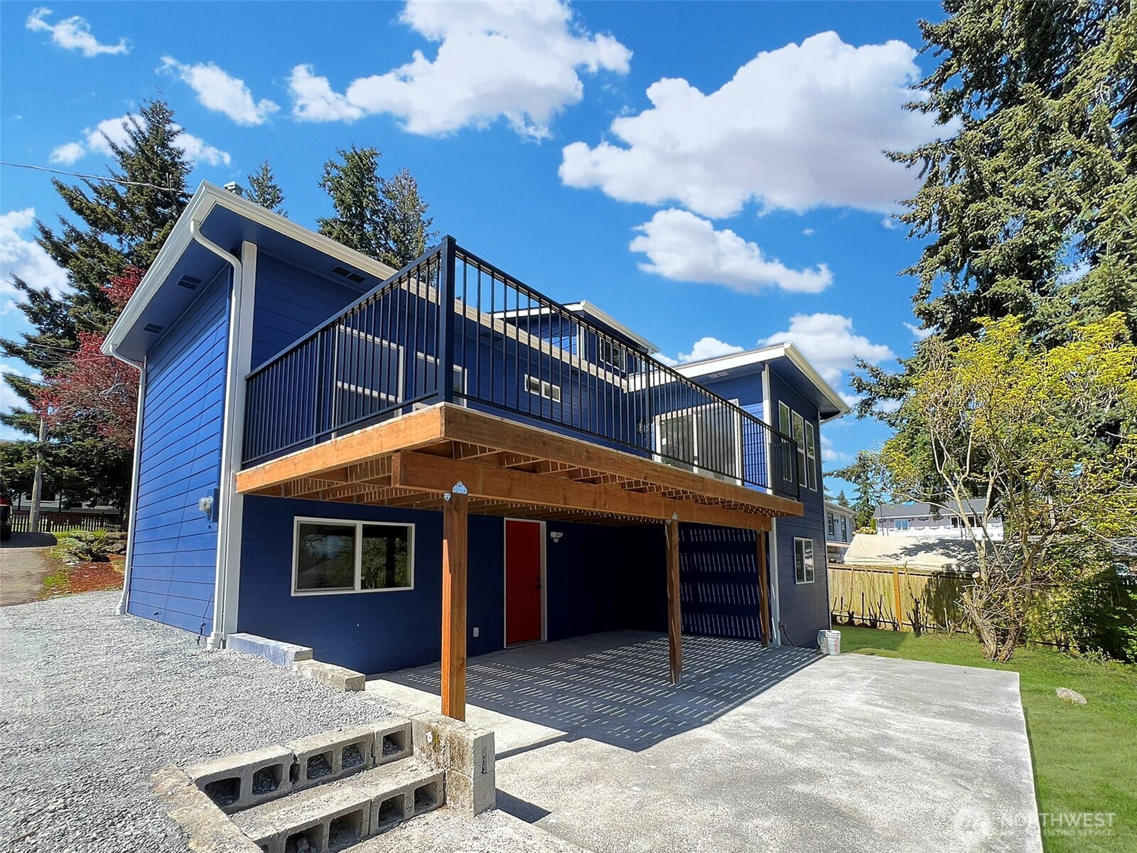 7403 Beverly Boulevard Everett, WA 98203 - Photo 18 of 19 a front view of a house with a yard