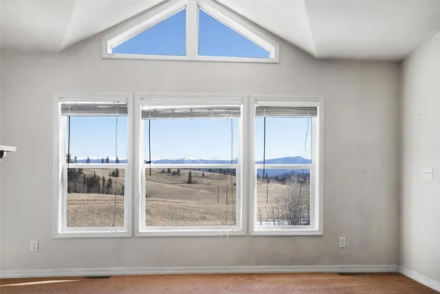 a kitchen with stainless steel appliances a stove a refrigerator and cabinets