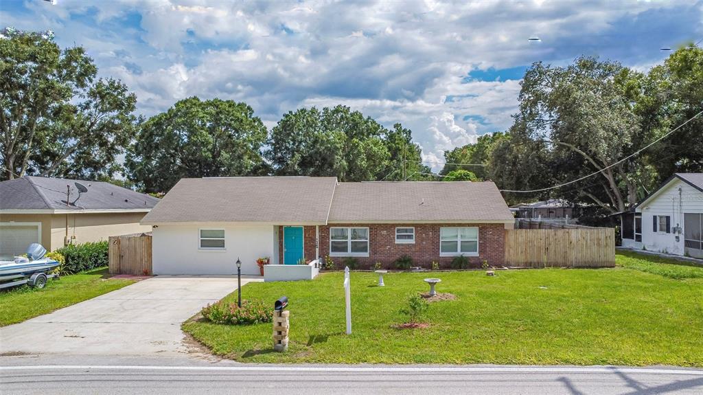 14 South Lake Fox Road Winter Haven, FL 33884 - Photo 1 of 1 a front view of a house with a yard
