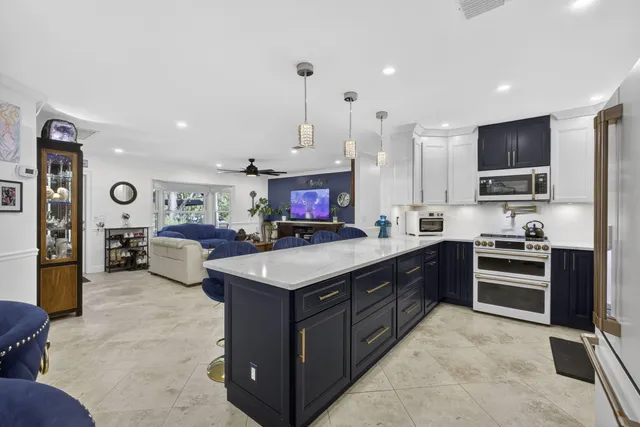 a kitchen with lots of counter space and a sink