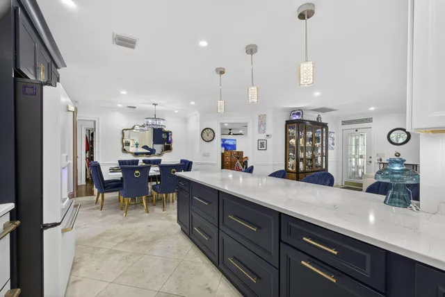 a bathroom with a sink a vanity and a mirror