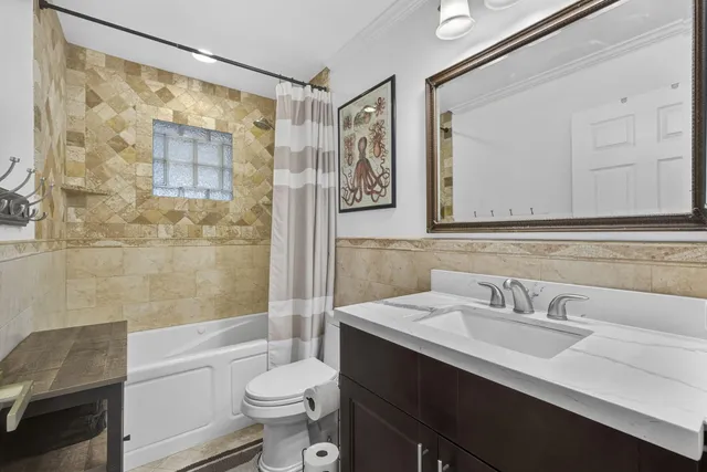 a view of backyard and entertaining space