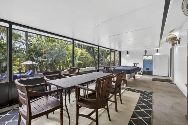 a view of a tree in the middle of a yard