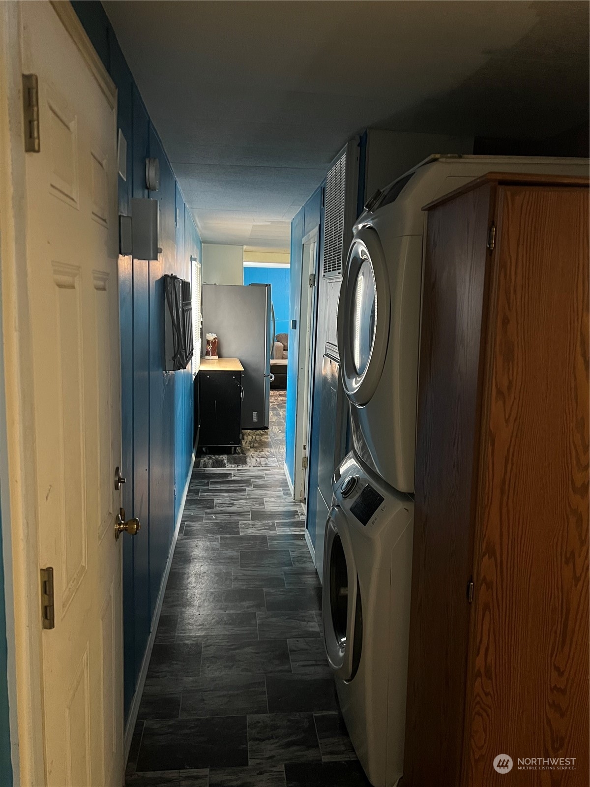 1331 West Pine Street, Unit 34 Walla Walla, WA 99362 - Photo 5 of 10 a view of a hallway with wooden floor and staircase
