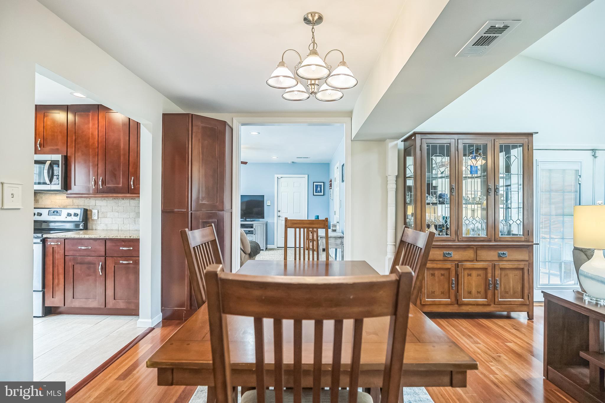 45 Dover Road Westampton, NJ 08060 - Photo 12 of 38 a view of a dining room with furniture window and wooden floor