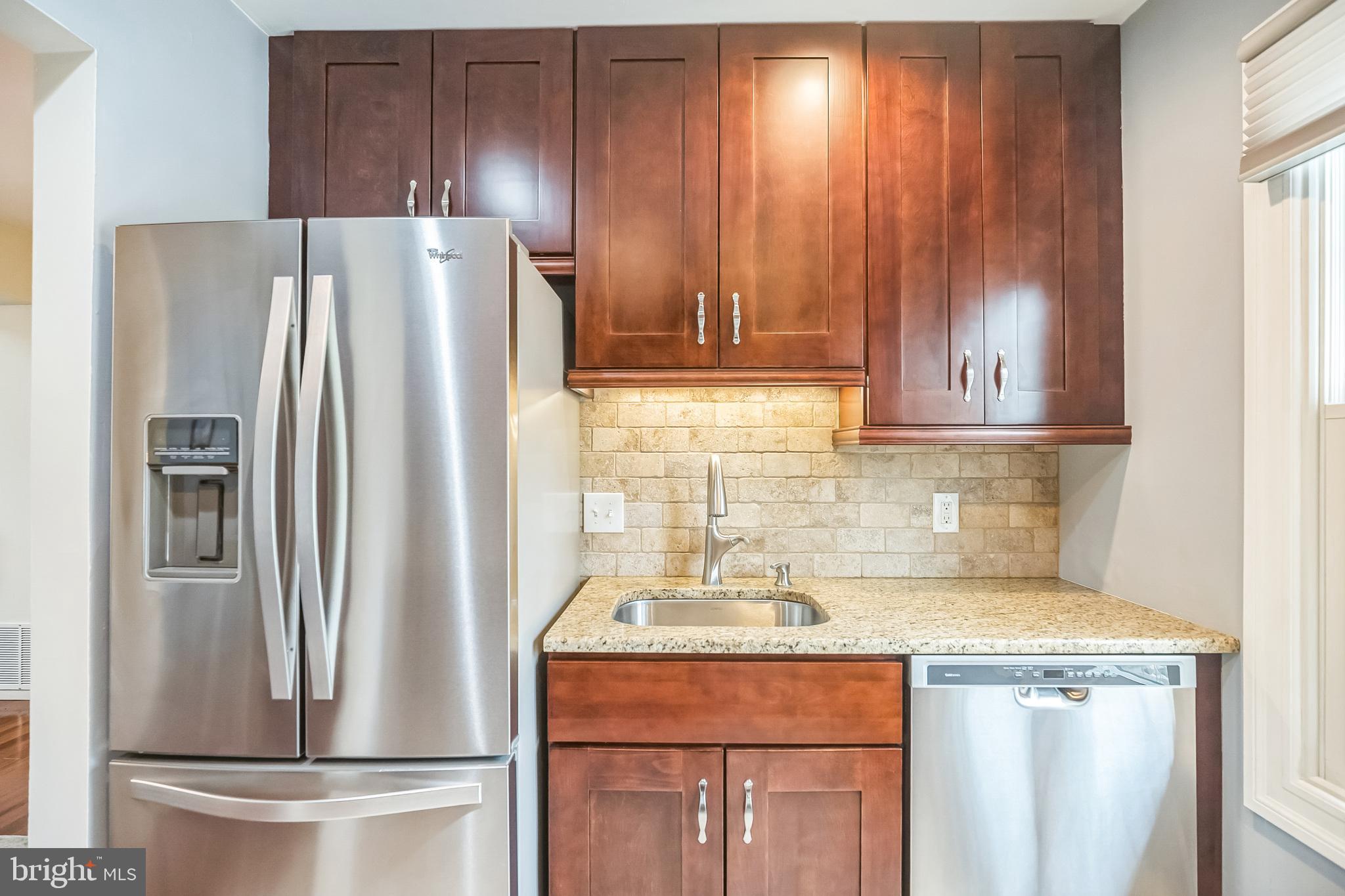 45 Dover Road Westampton, NJ 08060 - Photo 18 of 38 a kitchen with stainless steel appliances granite countertop a refrigerator and a stove