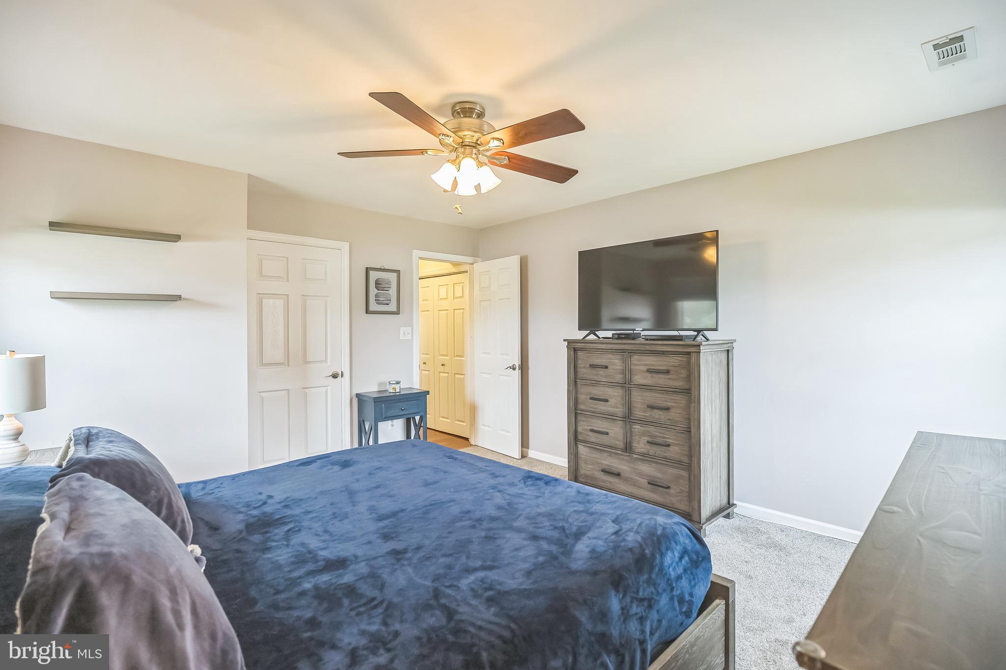 45 Dover Road Westampton, NJ 08060 - Photo 24 of 38 a bedroom with a bed and a flat tv screen