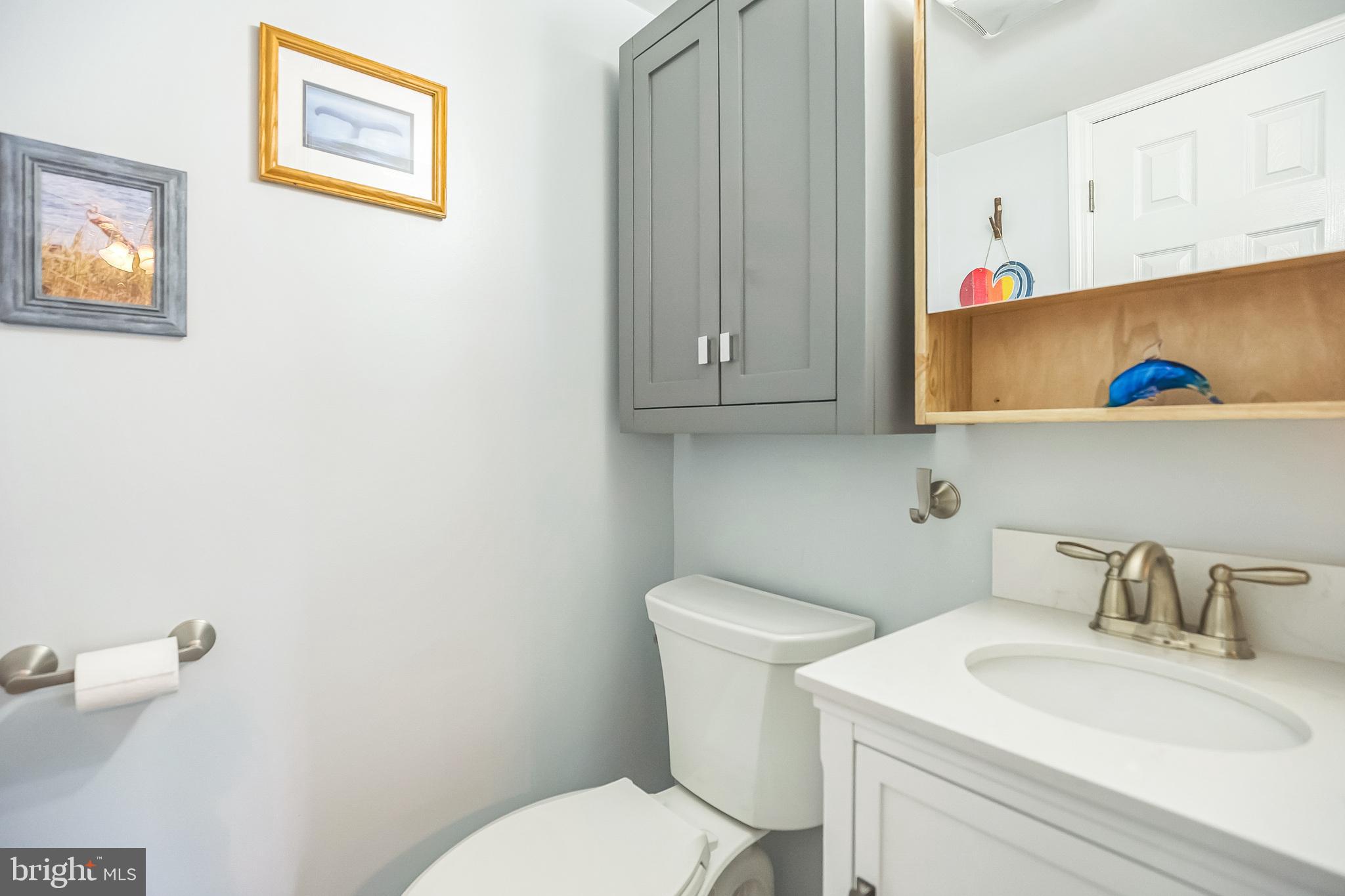 45 Dover Road Westampton, NJ 08060 - Photo 25 of 38 a bathroom with a toilet sink and mirror