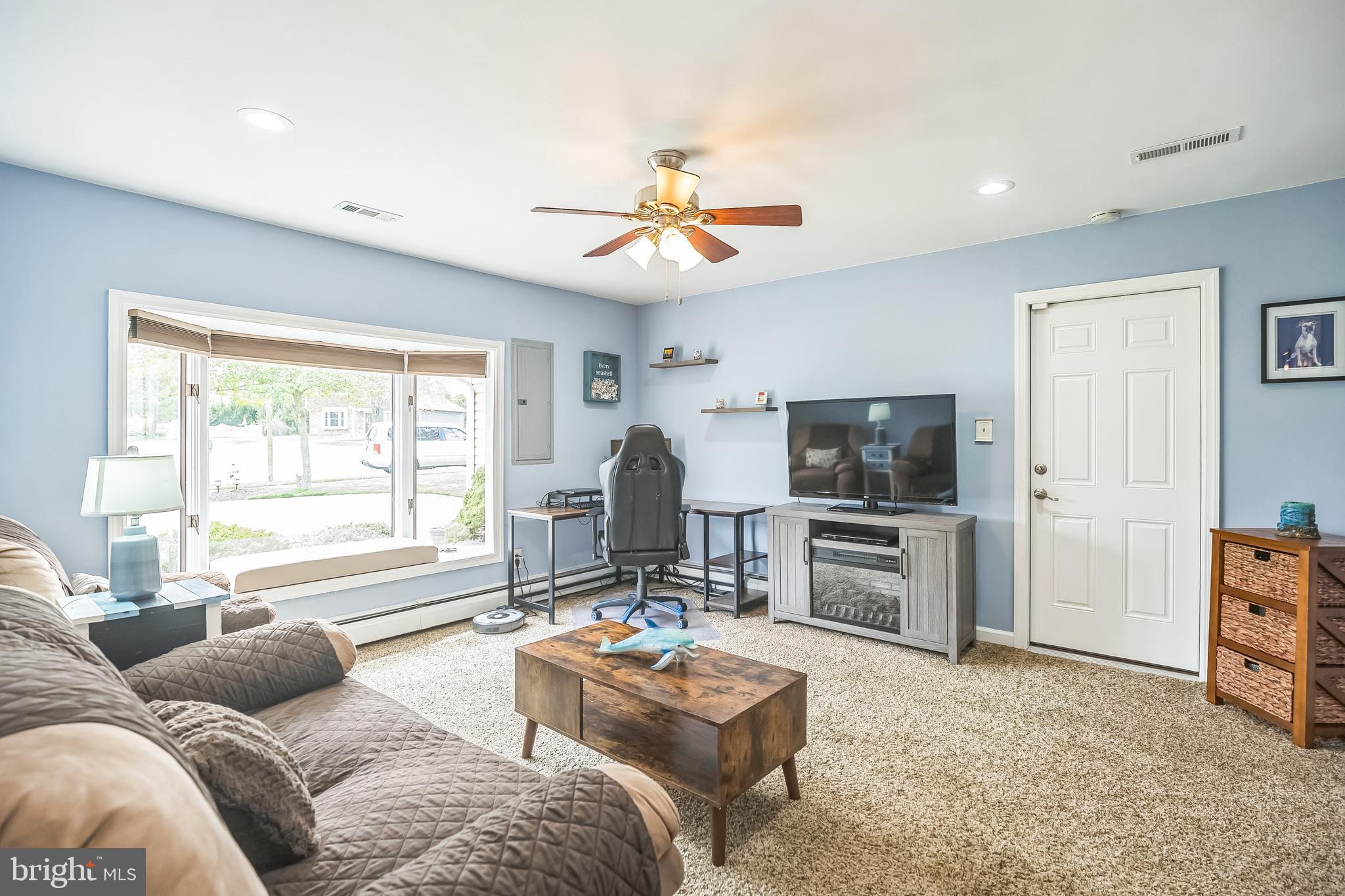 45 Dover Road Westampton, NJ 08060 - Photo 30 of 38 a living room with furniture and a flat screen tv