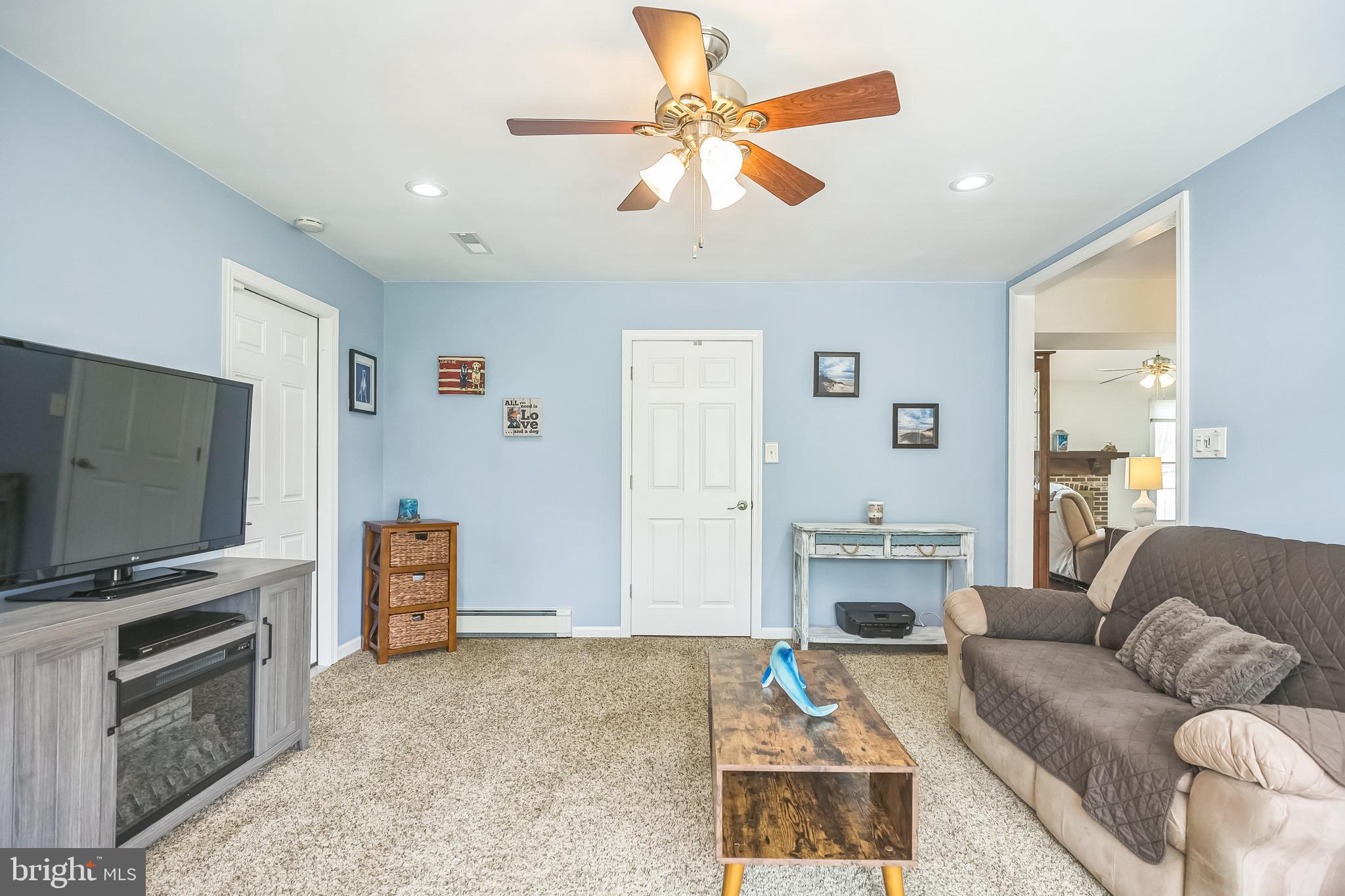 45 Dover Road Westampton, NJ 08060 - Photo 31 of 38 a living room with furniture and a flat screen tv