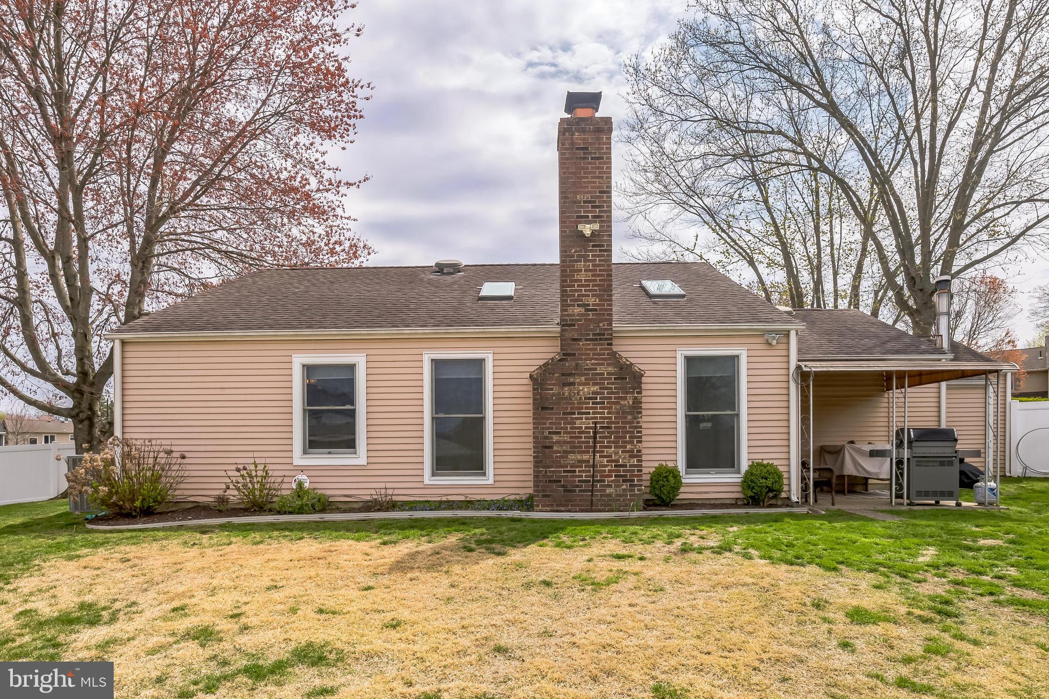 45 Dover Road Westampton, NJ 08060 - Photo 35 of 38 a front view of a house with a garden