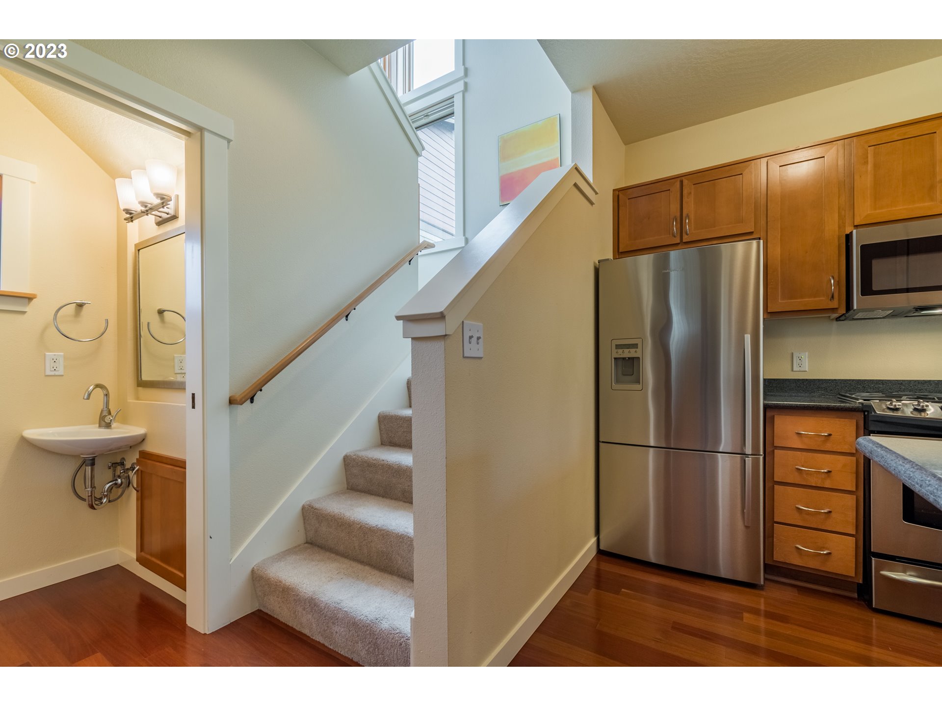 1410 Perdue Loop Eugene, OR 97401 - Photo 13 of 32 a kitchen with stainless steel appliances a refrigerator and a stove top oven