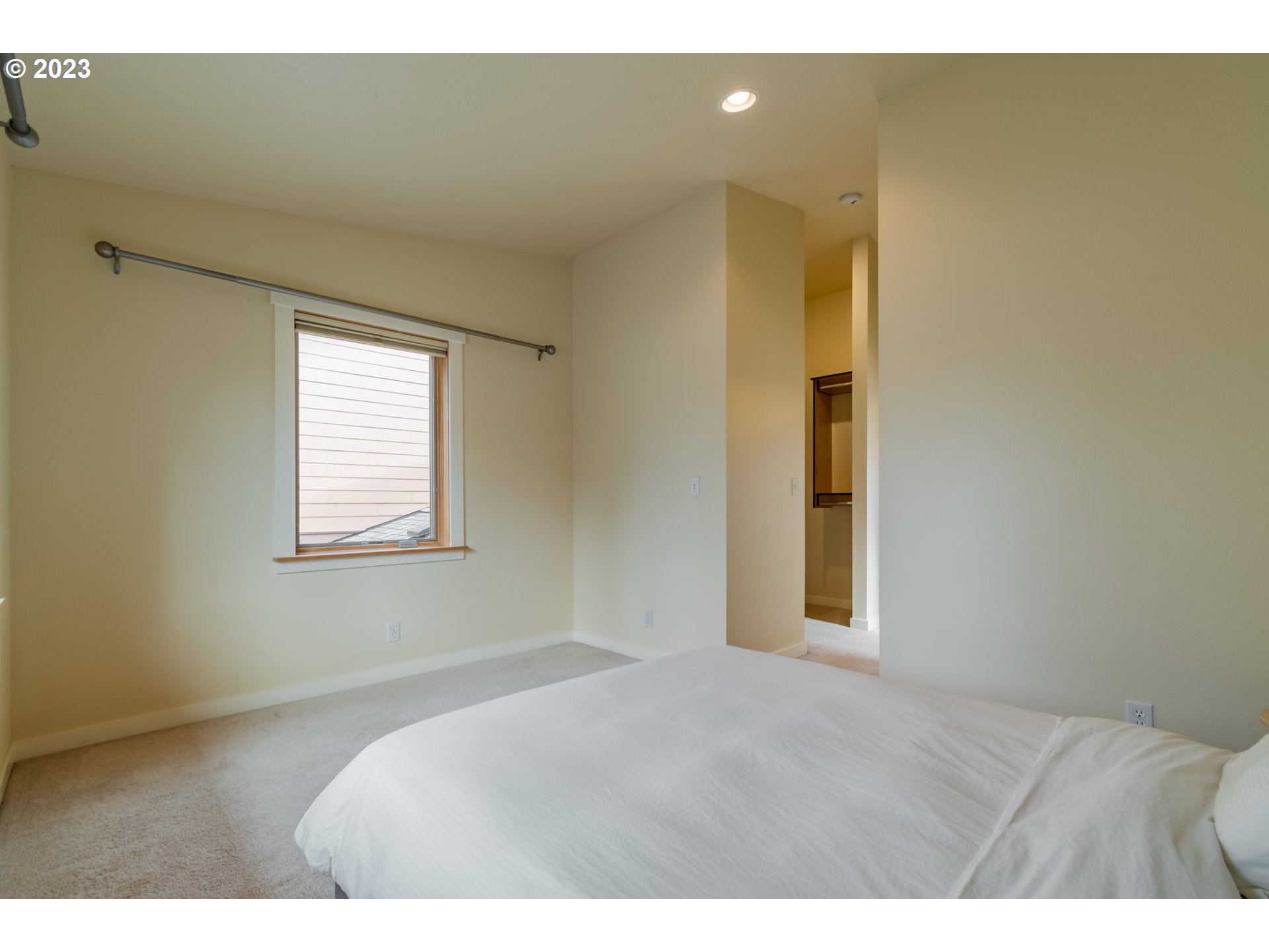 1410 Perdue Loop Eugene, OR 97401 - Photo 20 of 32 a bedroom with a bed and a window