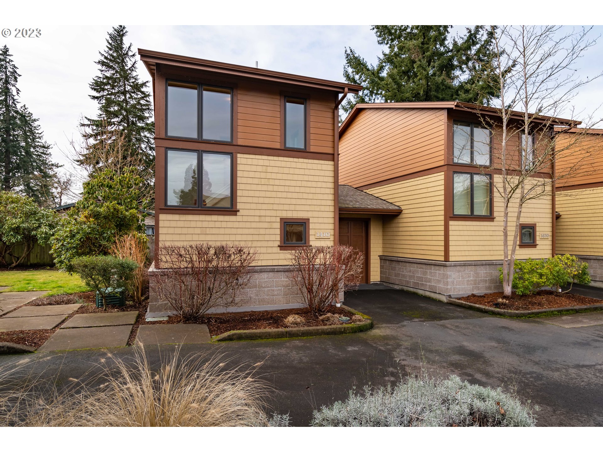 1410 Perdue Loop Eugene, OR 97401 - Photo 2 of 32 a view of a house with a yard