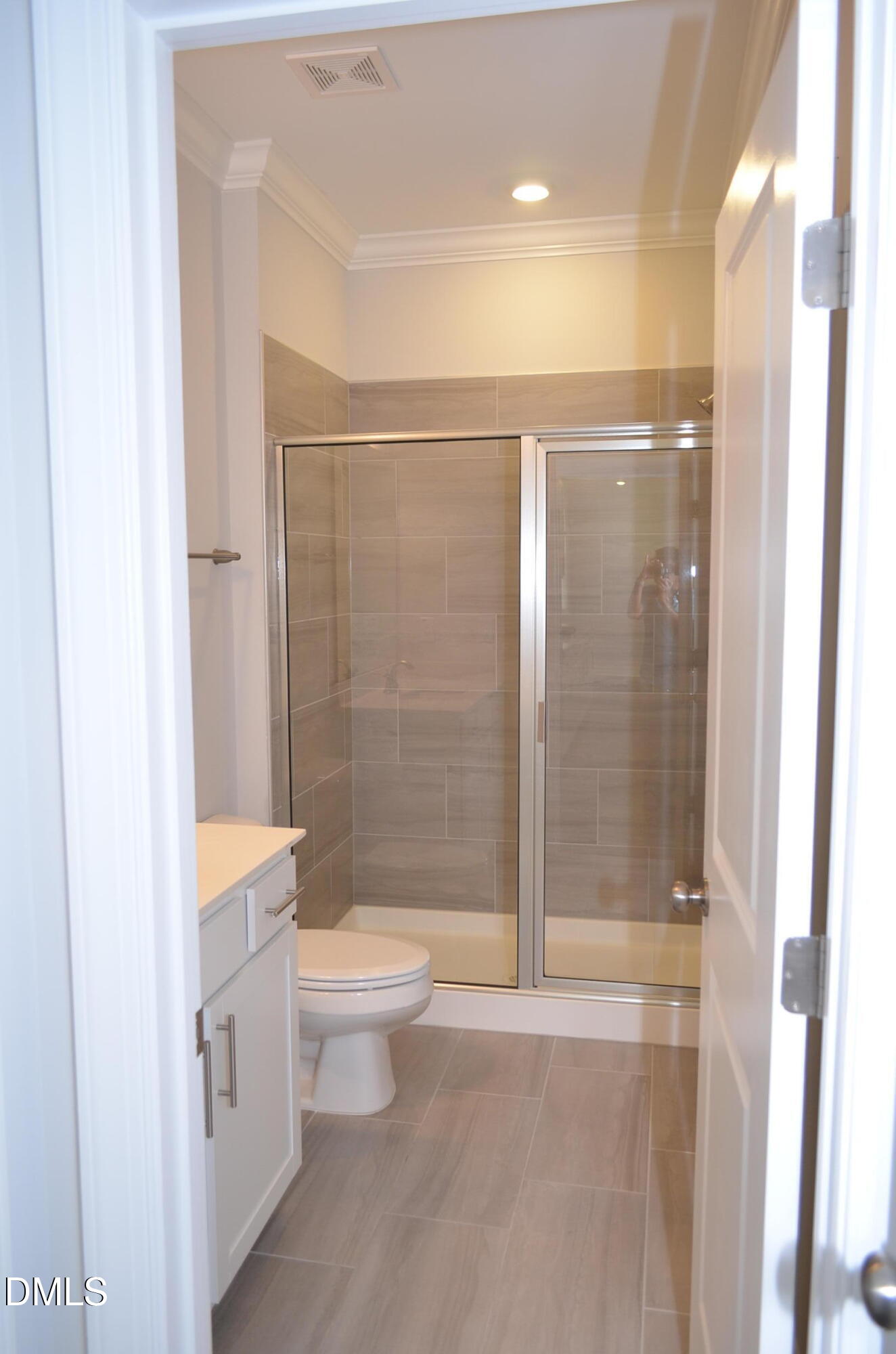 268 Edge Of Auburn Boulevard Raleigh, NC 27610 - Photo 17 of 36 a bathroom with a shower a toilet and a sink