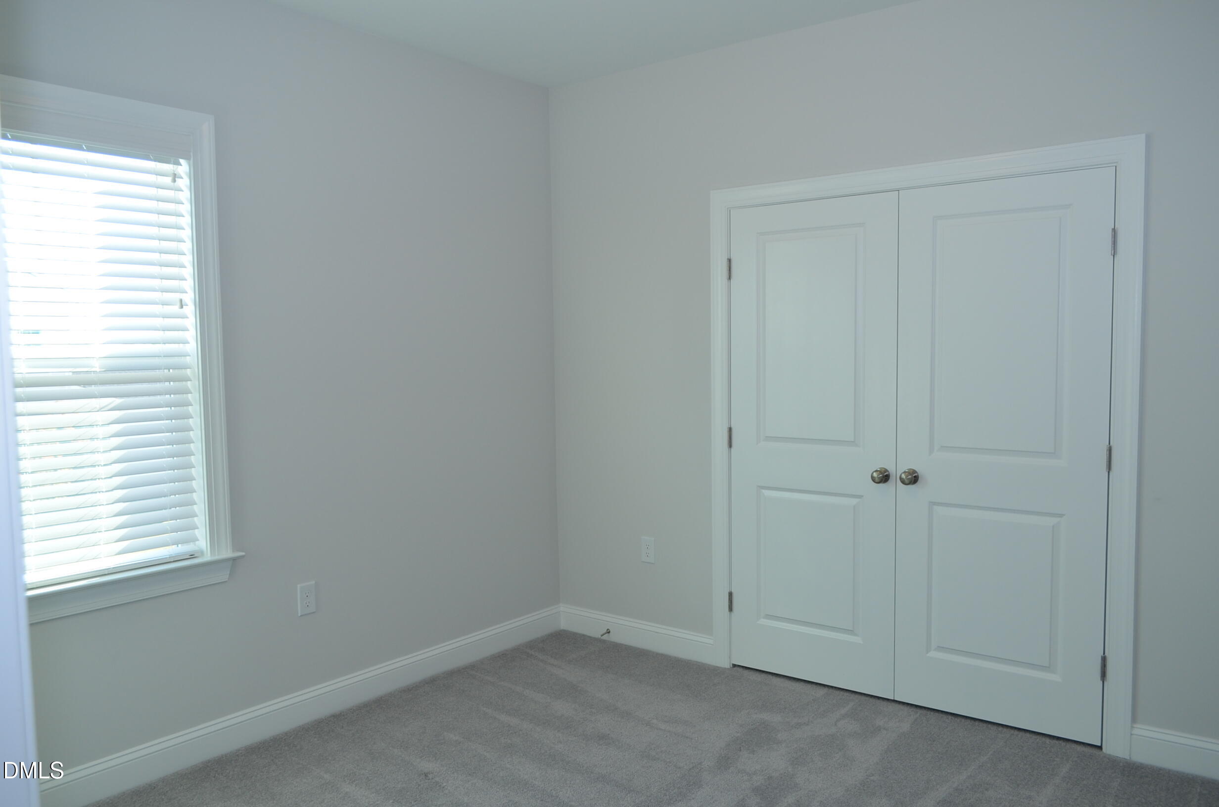 268 Edge Of Auburn Boulevard Raleigh, NC 27610 - Photo 33 of 36 an empty room with a window