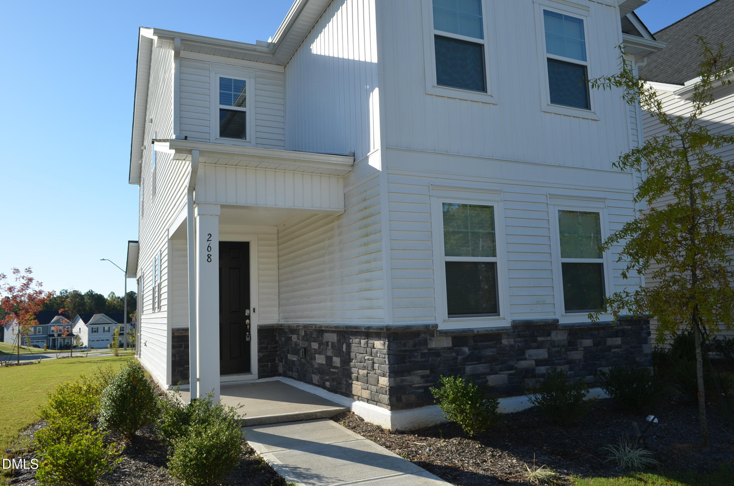 268 Edge Of Auburn Boulevard Raleigh, NC 27610 - Photo 7 of 36 a front view of a house with garden