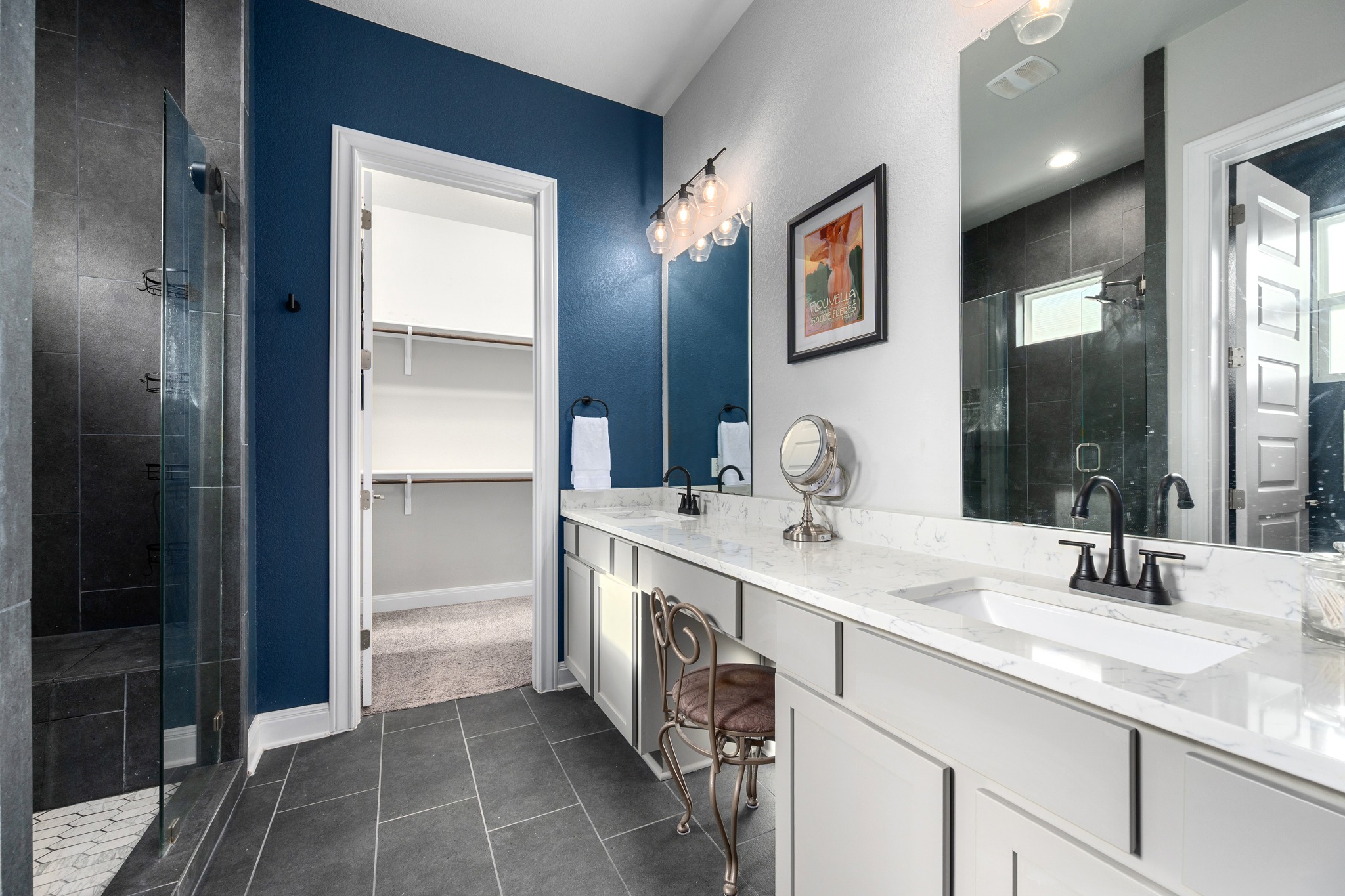 3925 Tavarez Street Round Rock, TX 78628 - Photo 14 of 27 Primary bath is awesome with frameless glass shower door, upgraded tile