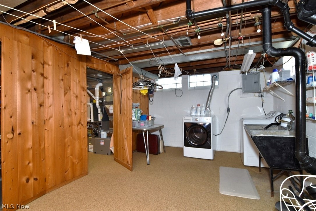 15991 Henley Road Cleveland, OH 44112 - Photo 32 of 36 separate laundry-utility area with Nature Stone flooring