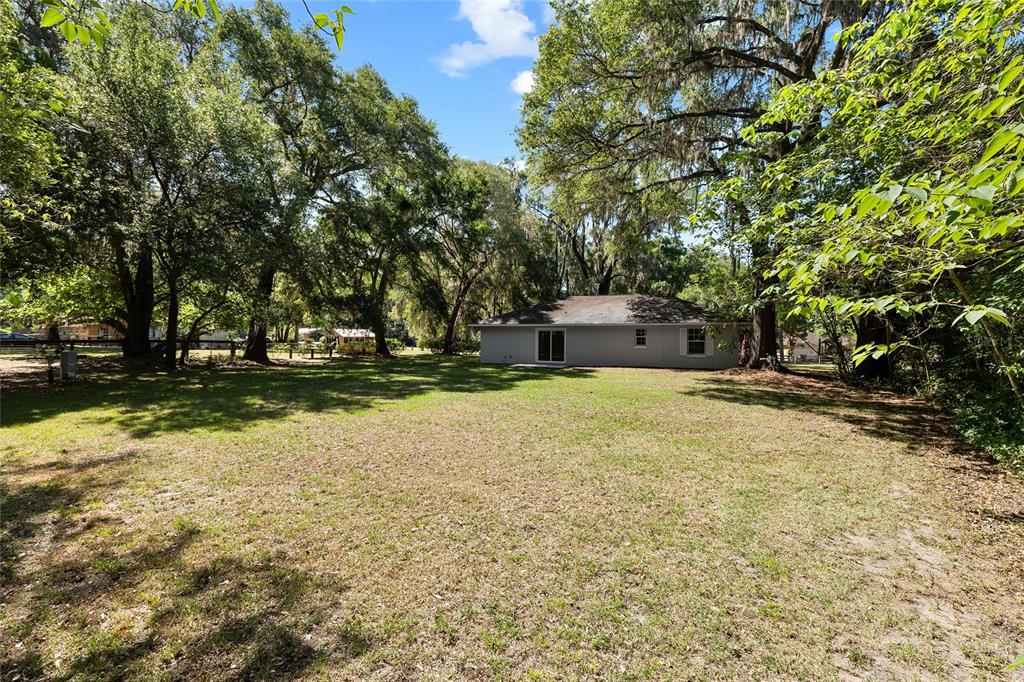 4329 Northwest 155th Street Reddick, FL 32686 - Photo 50 of 52 a house view with swimming pool