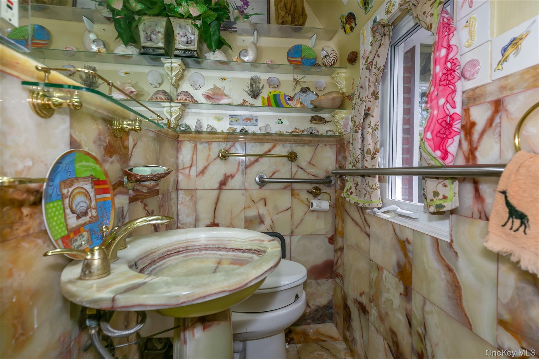 200 Myrtle Drive Great Neck, NY 11021 - Photo 11 of 25 a bathroom with a sink and a mirror