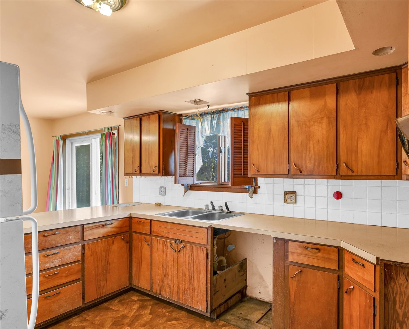1512 Locust Avenue Rantoul, IL 61866 - Photo 14 of 39 a bathroom with a sink a mirror and a window