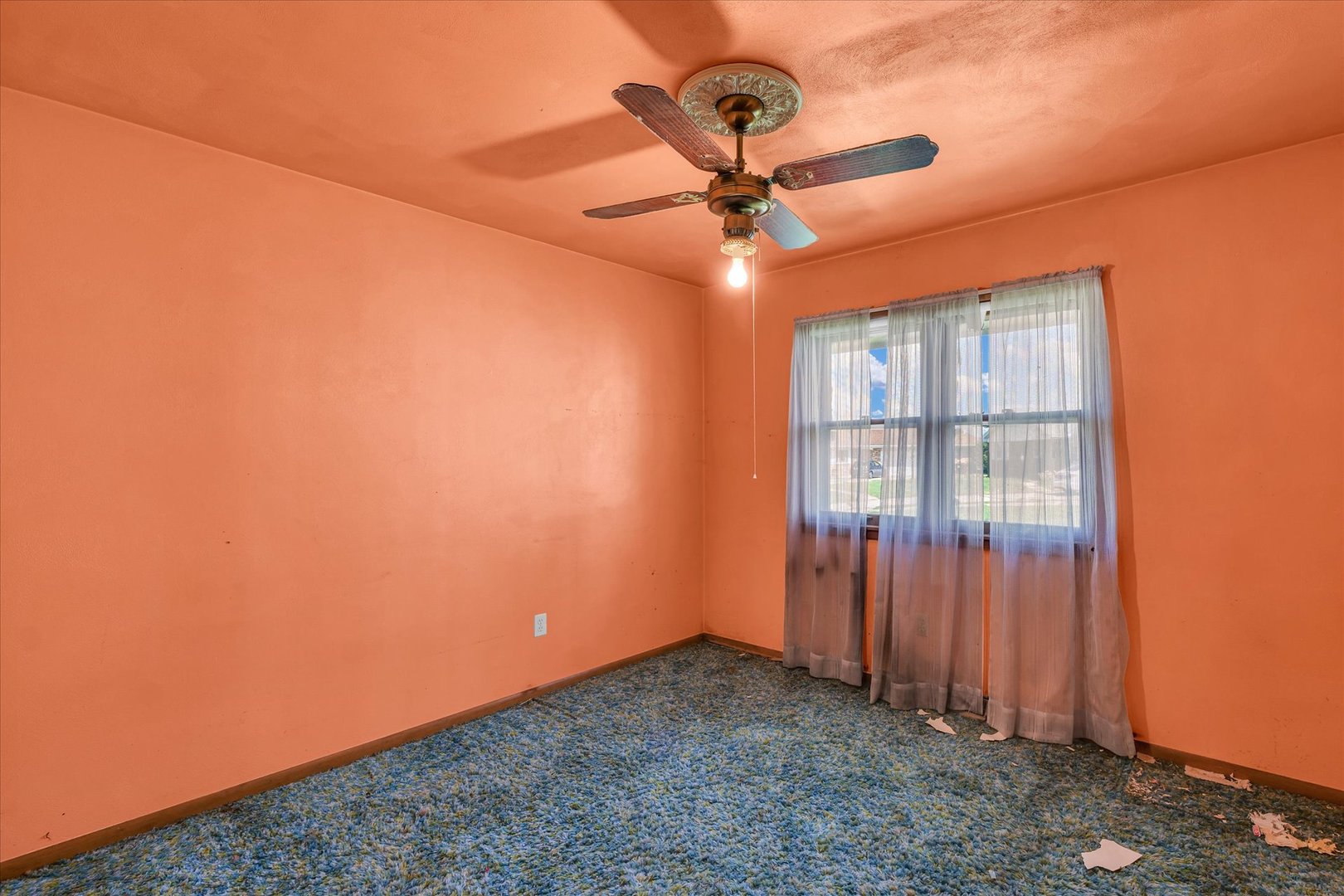 1512 Locust Avenue Rantoul, IL 61866 - Photo 20 of 39 an empty room with a window and a fan