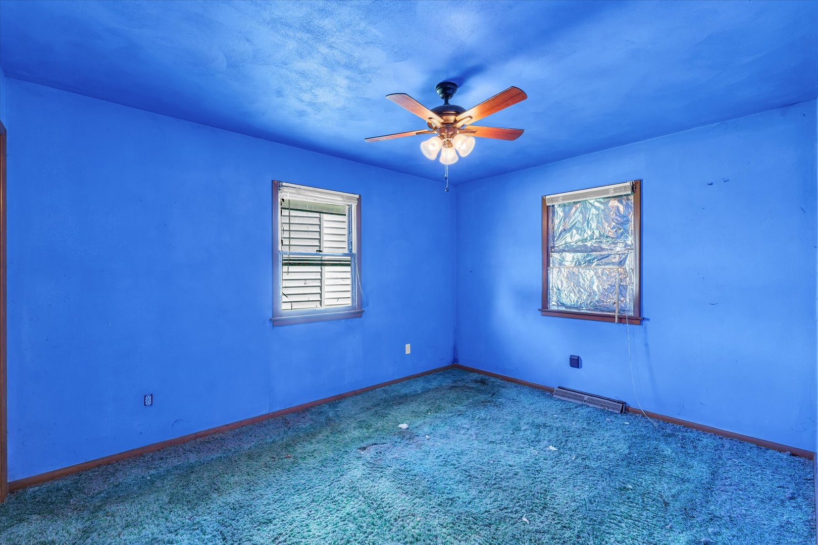 1512 Locust Avenue Rantoul, IL 61866 - Photo 22 of 39 a view of an empty room with window and wooden floor