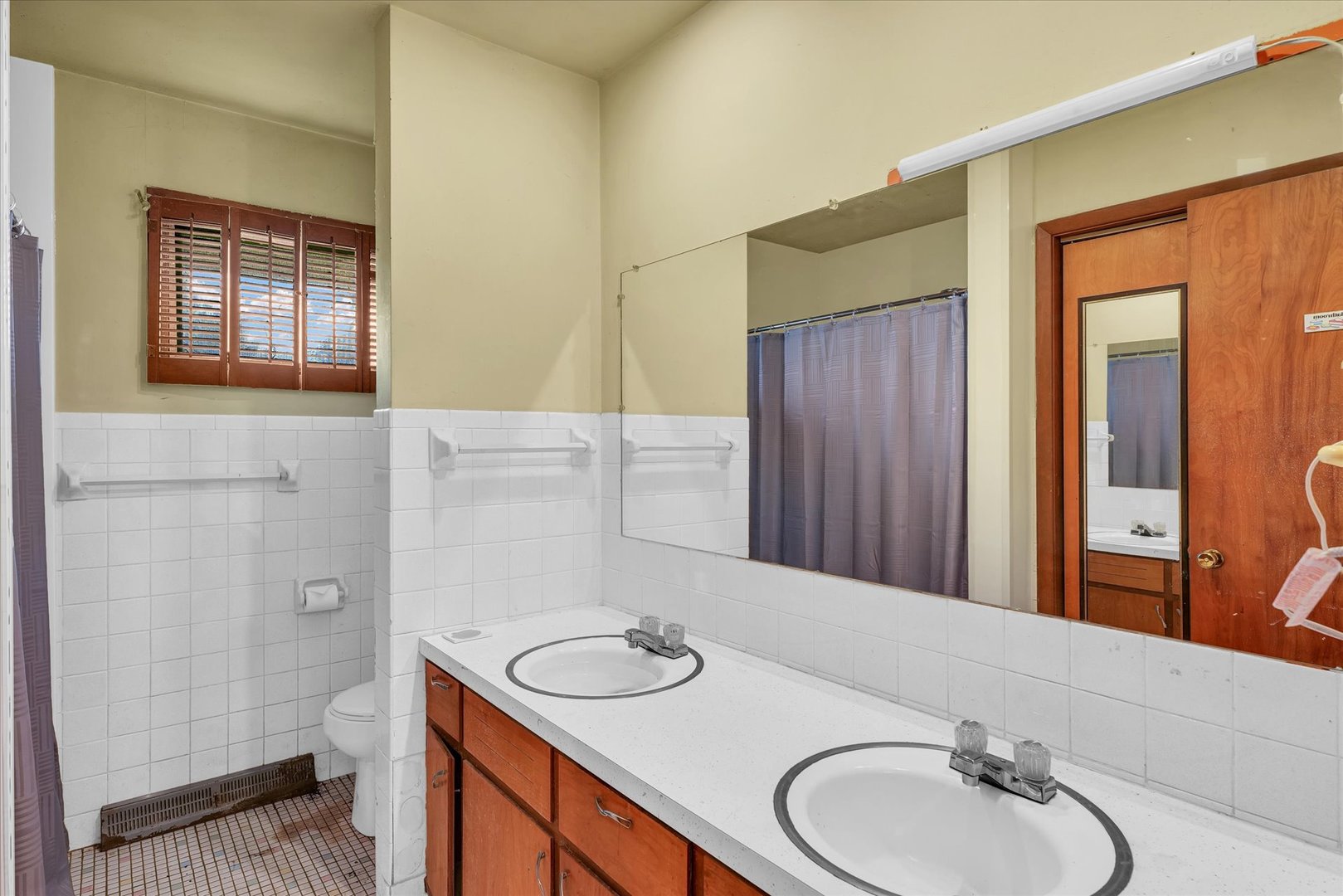 1512 Locust Avenue Rantoul, IL 61866 - Photo 25 of 39 a bathroom with a sink and a mirror