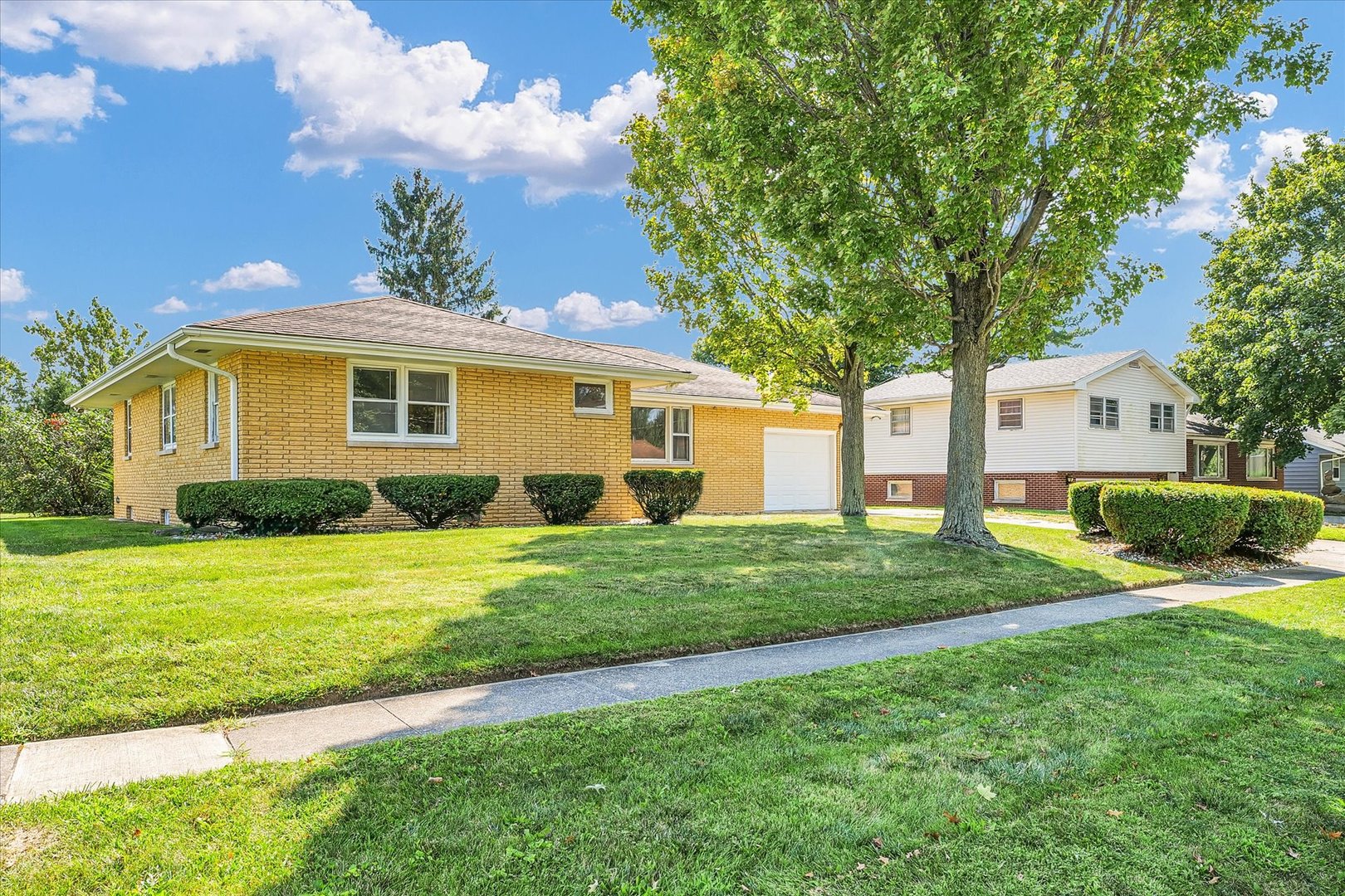 1512 Locust Avenue Rantoul, IL 61866 - Photo 3 of 39 a view of a house with backyard and garden