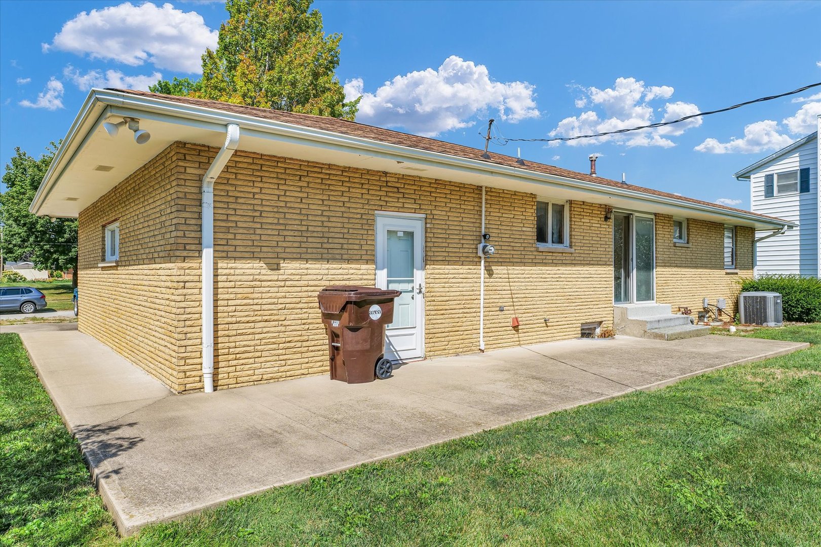 1512 Locust Avenue Rantoul, IL 61866 - Photo 38 of 39 a view of a house with backyard and sitting area
