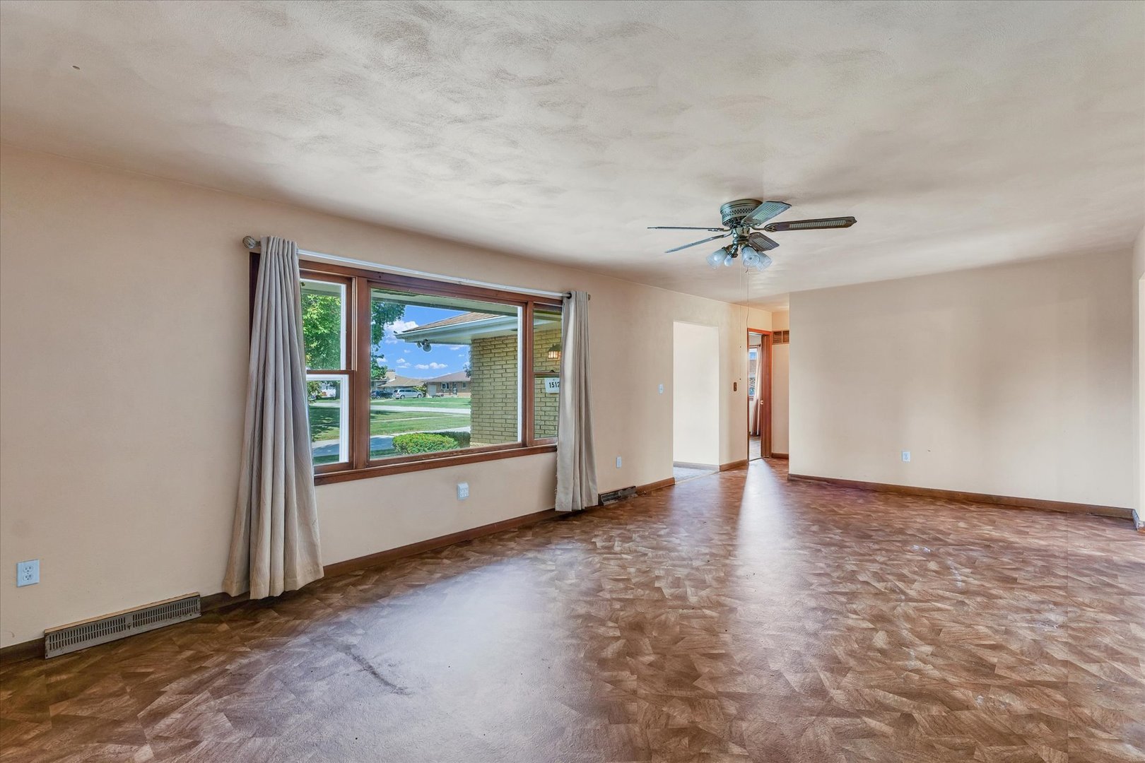 1512 Locust Avenue Rantoul, IL 61866 - Photo 6 of 39 a view of an empty room with a window