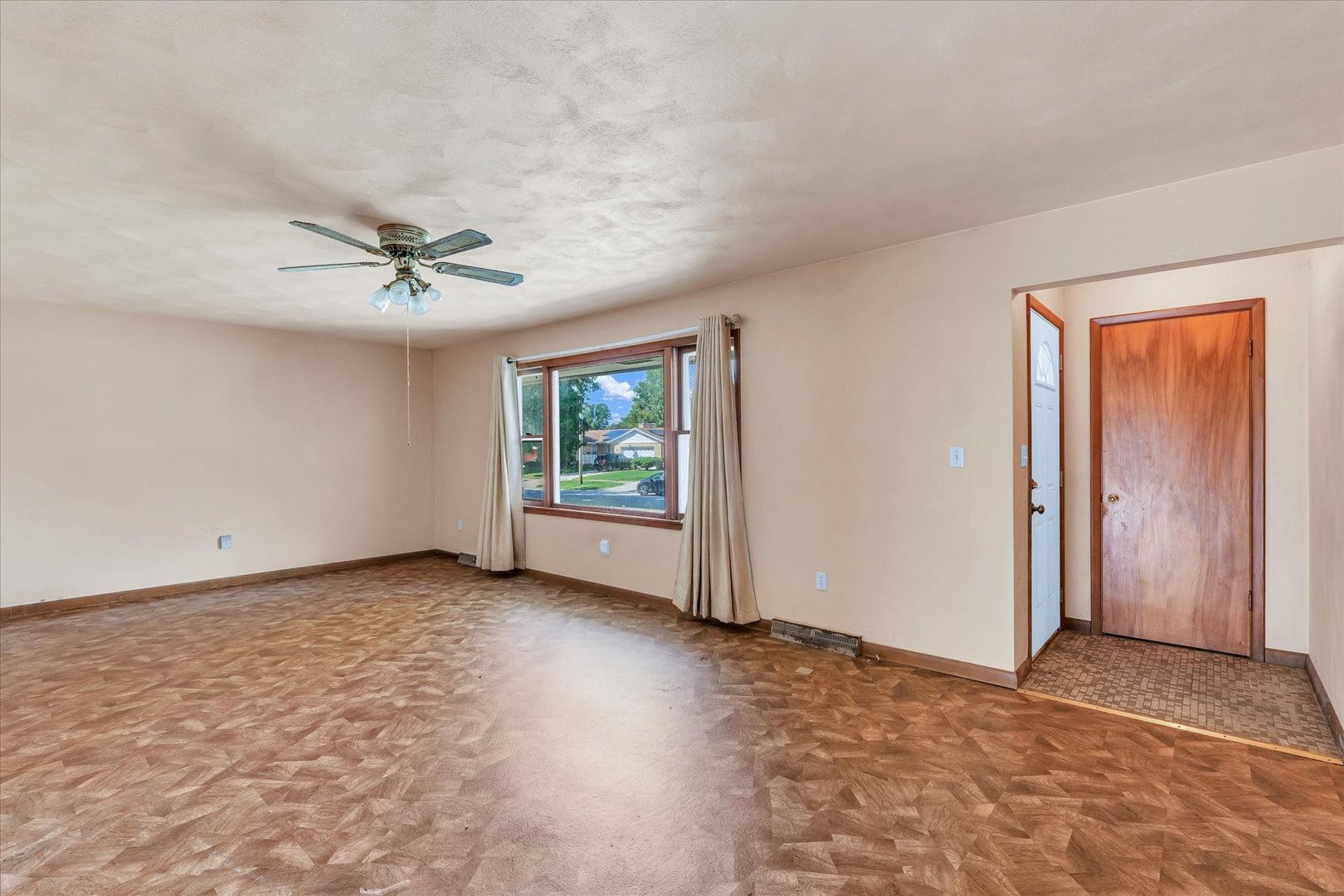 1512 Locust Avenue Rantoul, IL 61866 - Photo 7 of 39 a view of an empty room with a window