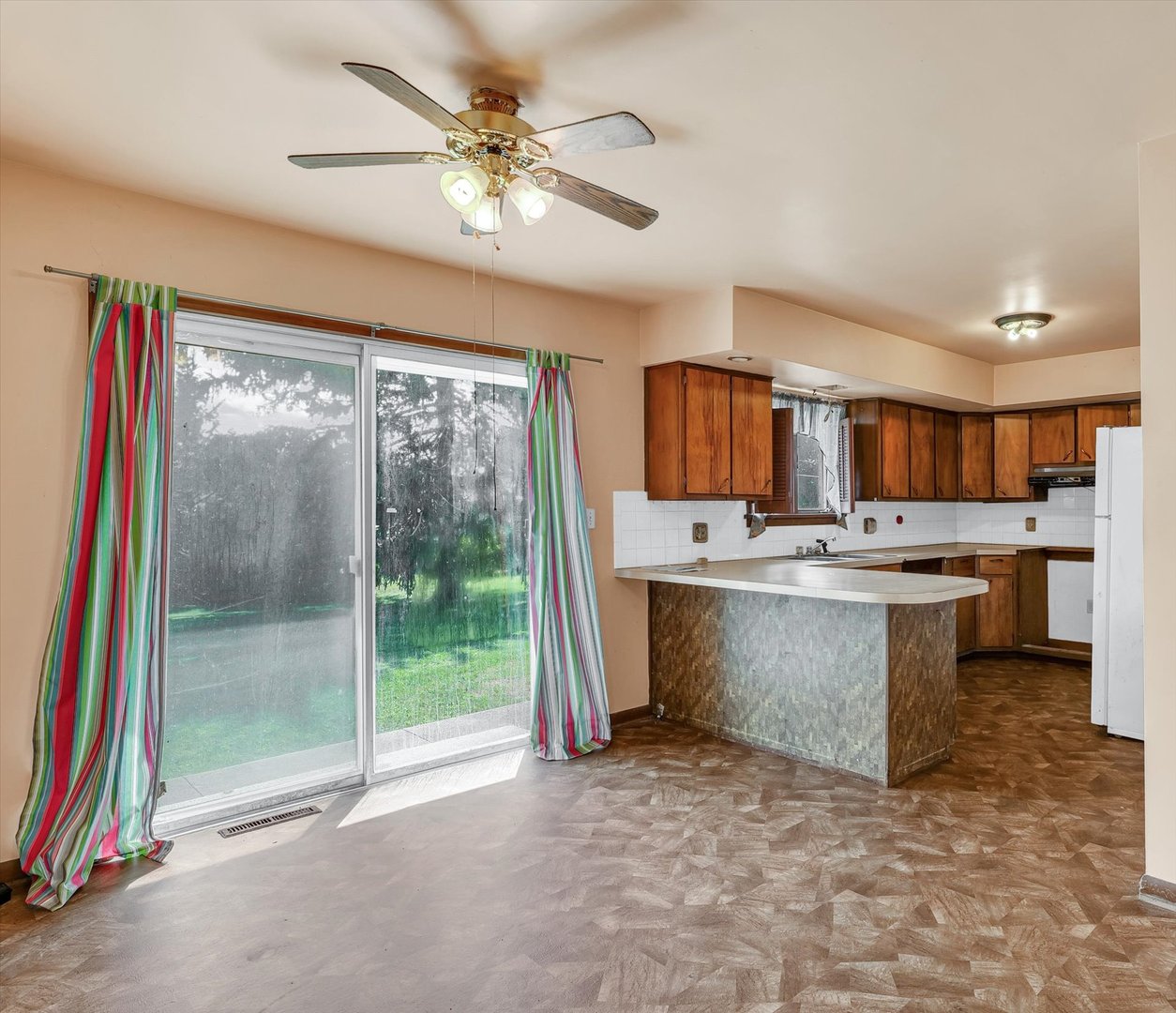 1512 Locust Avenue Rantoul, IL 61866 - Photo 9 of 39 a large kitchen with stainless steel appliances granite countertop a stove and a sink