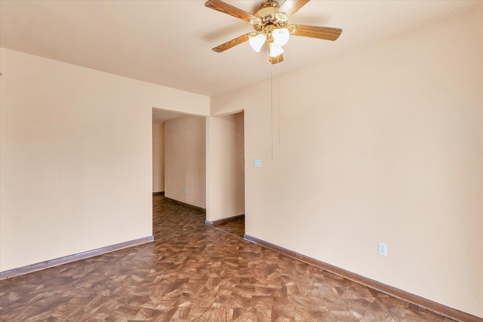 1512 Locust Avenue Rantoul, IL 61866 - Photo 10 of 39 an empty room with a ceiling fan and a window