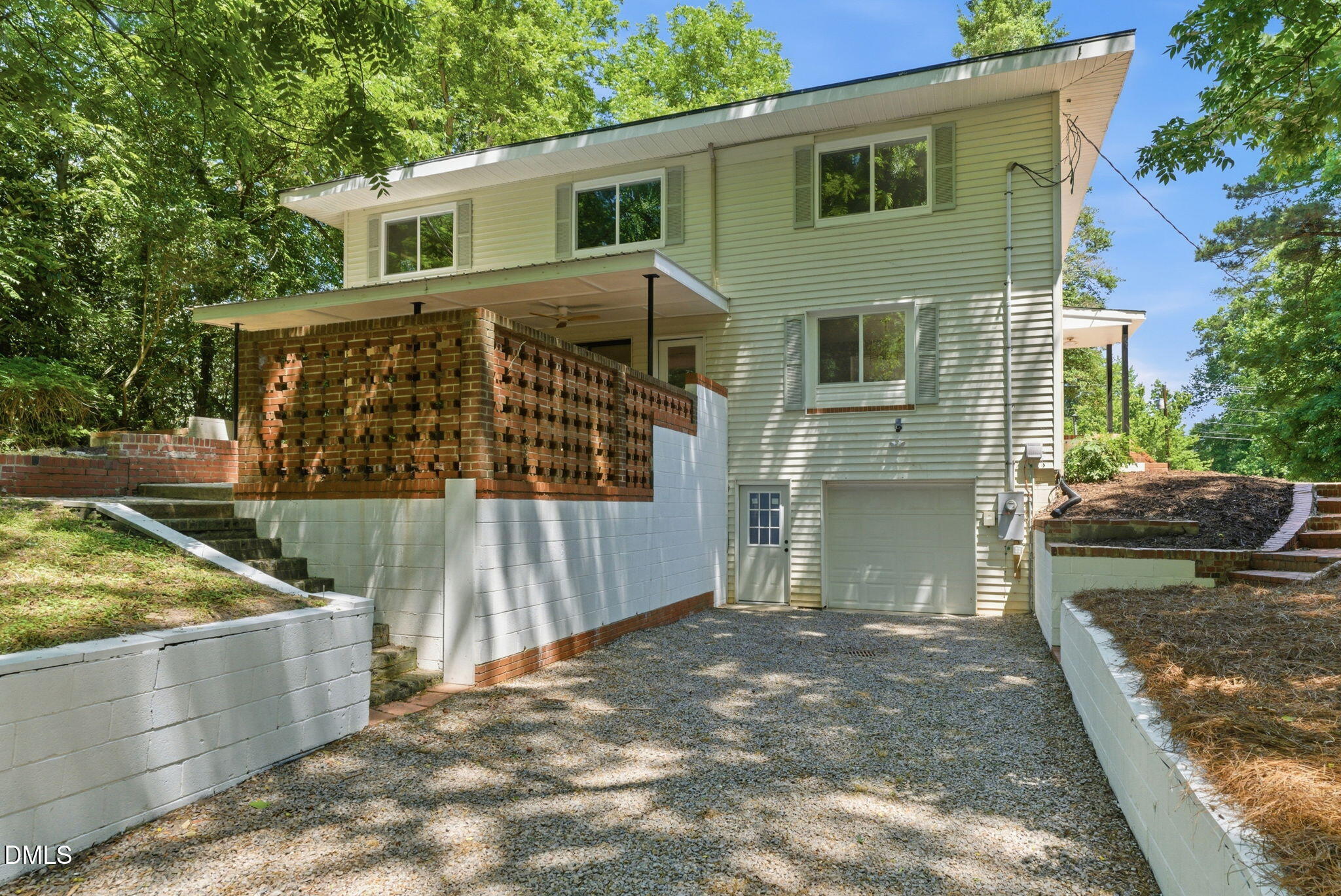 1615 Carbonton Road Sanford, NC 27330 - Photo 46 of 49 a view of a wooden house with a yard