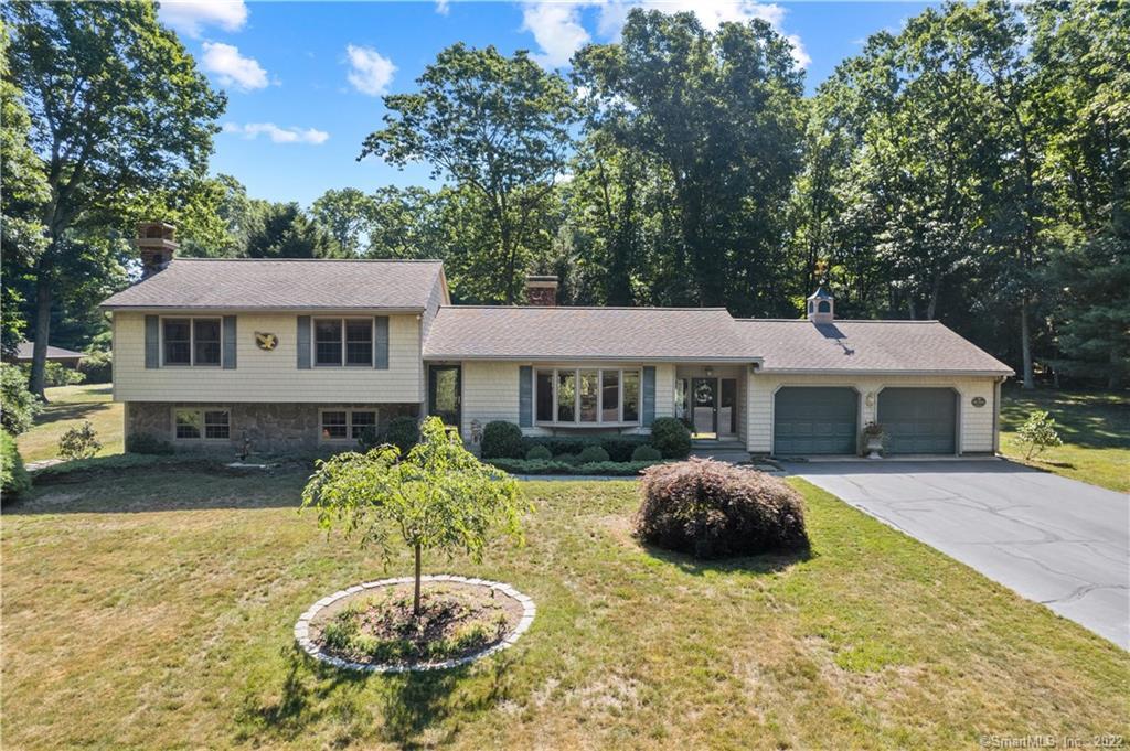 98 Cato Corner Road Colchester, CT 06415 - Photo 1 of 1 a swimming pool with outdoor seating and yard