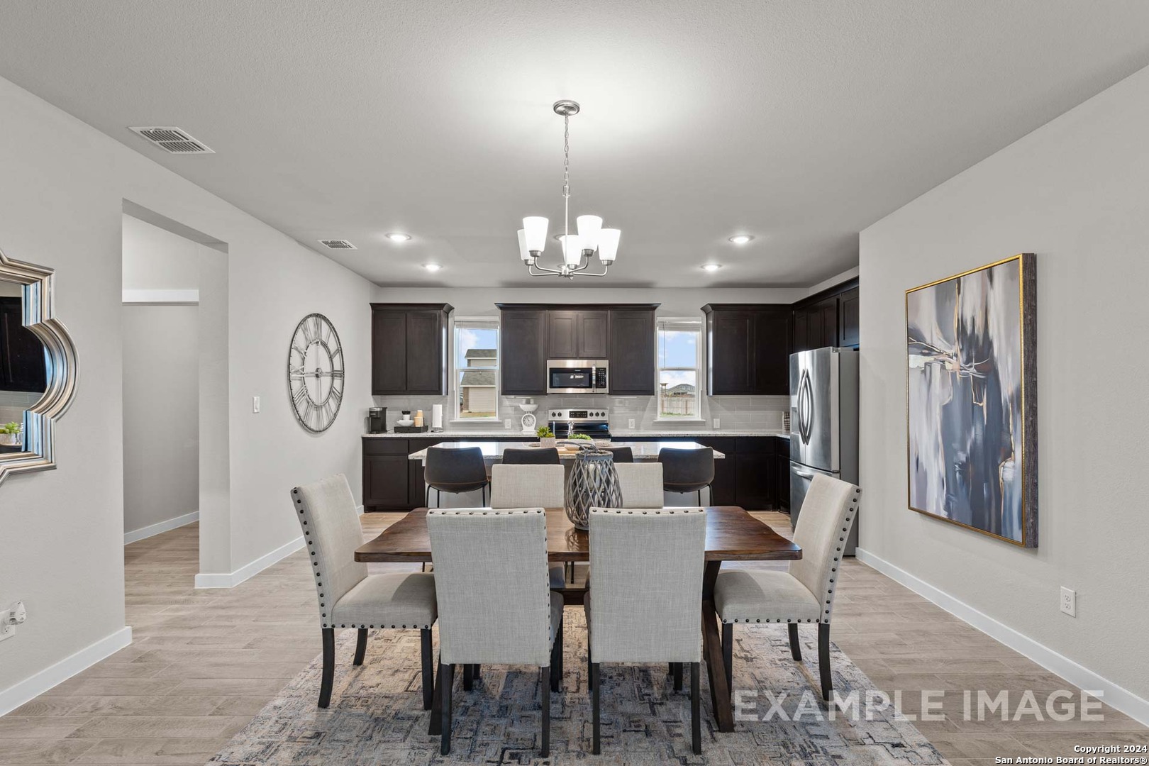 429 Tims Way Seguin, TX 78155 - Photo 19 of 50 a view of a dining room with furniture window and wooden floor