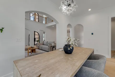 a bedroom with a bed and a fireplace