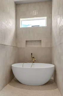 a view of a kitchen with electric appliances